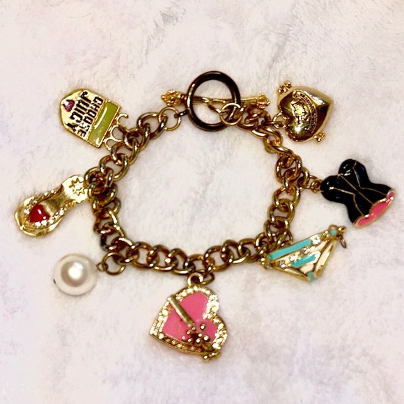 Juicy Couture Jewelry - Rare Vintage Juicy Couture Gold Tone Charm Bracelet locket corset